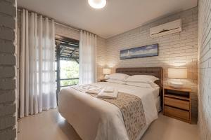 Katil atau katil-katil dalam bilik di SUNSET PORTO BELO Locaçoes +59 gambar