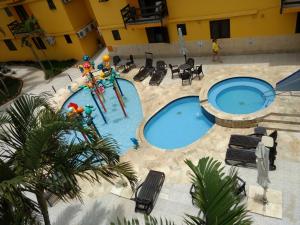 an overhead view of a pool in a hotel at Pousada do Frances in Bertioga