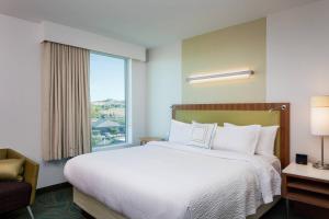 Postel nebo postele na pokoji v ubytování SpringHill Suites by Marriott Kennewick Tri-Cities