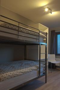 - une chambre avec 2 lits superposés dans l'établissement FLY in POPS, à Poperinge
