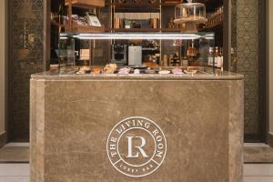 a sign that says the living room bakery at Sheraton Cascais Resort - Hotel & Residences in Cascais