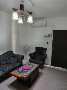 Posezení v ubytování الشقة العائلية الحديثة familial new flat