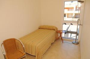 Кровать или кровати в номере Residencial Marina de Port