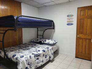 Postel nebo postele na pokoji v ubytování Azucar Miami