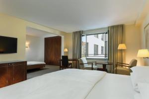 Voodi või voodid majutusasutuse Sheraton Carlton Nuernberg toas