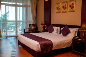 Postel nebo postele na pokoji v ubytování Protea Hotel by Marriott Entebbe