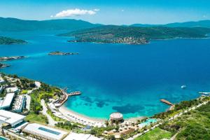 an aerial view of a beach and a body of water at Le Meridien Bodrum Beach Resort in Bogazici