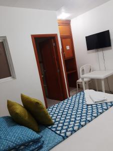 TV a/nebo společenská místnost v ubytování Hotel Palacio Real