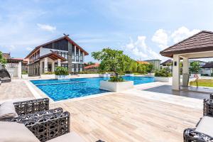 an image of a swimming pool in a villa at Stylish Mactan Stay Near Airport 2-6 guest in Sudtungan