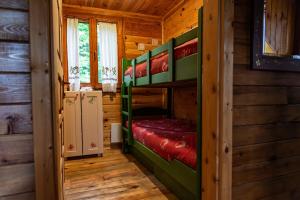 Postel nebo postele na pokoji v ubytování Drvene kuće ŠUŠKA - Wooden Houses SUSKA