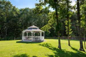a gazebo in the middle of a grass field at Portland Sheraton at Sable Oaks in South Portland
