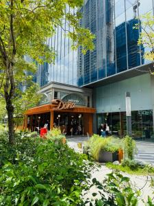 a building in a city with tall buildings at Agile Dream House Bukit Bintang TRX in Kuala Lumpur