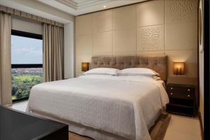 Katil atau katil-katil dalam bilik di Sheraton Lagos Hotel