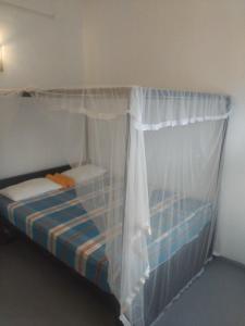 Postel nebo postele na pokoji v ubytování Moon House