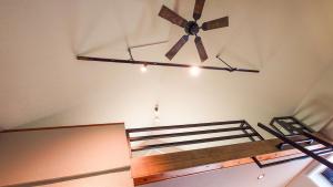 A bed or beds in a room at サンメール座間味アネックス