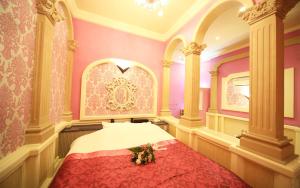 Postel nebo postele na pokoji v ubytování ハーフムーン富士宮 Adult only