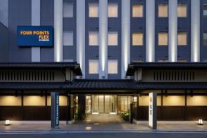 a building with a sign that reads room pumps help at Four Points Flex by Sheraton Kyoto Oike in Kyoto