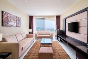 Posezení v ubytování Protea Hotel by Marriott Kampala Skyz