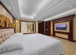 Voodi või voodid majutusasutuse Yueda Financial City International Hotel toas