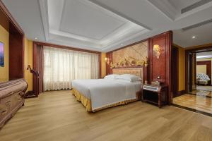 Voodi või voodid majutusasutuse Yueda Financial City International Hotel toas