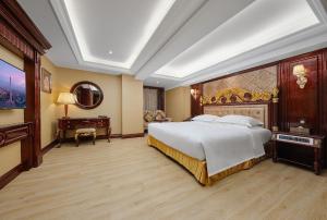 Voodi või voodid majutusasutuse Yueda Financial City International Hotel toas