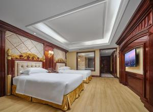 Voodi või voodid majutusasutuse Yueda Financial City International Hotel toas