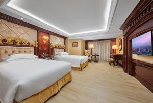 Voodi või voodid majutusasutuse Yueda Financial City International Hotel toas