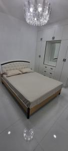 Postel nebo postele na pokoji v ubytování Shanis Luxurious Home