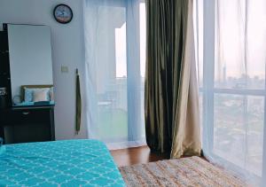 Postel nebo postele na pokoji v ubytování The Element Condo 3BR with KL Skyscraper View