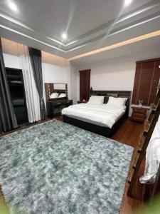 Postel nebo postele na pokoji v ubytování Jazzy Pool Villa Hatyai