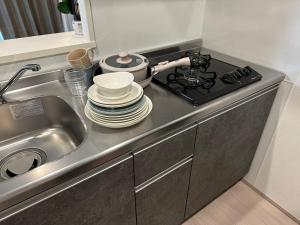 Hotel Reference Ropponmatsu Condominium 주방 또는 간이 주방