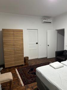 Postel nebo postele na pokoji v ubytování Casa Estrela - Sea & Art Guesthouse