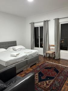 Postel nebo postele na pokoji v ubytování Casa Estrela - Sea & Art Guesthouse