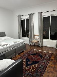 Postel nebo postele na pokoji v ubytování Casa Estrela - Sea & Art Guesthouse