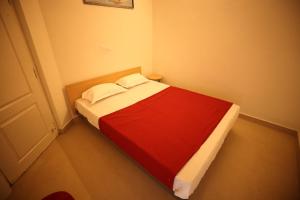 Ένα ή περισσότερα κρεβάτια σε δωμάτιο στο Lishikaa's Inn +11 φωτογραφίες