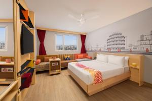 Postel nebo postele na pokoji v ubytování Ginger Jaipur + 29 fotografií