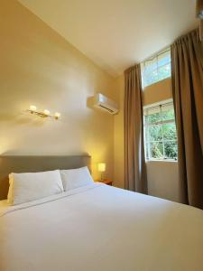 Postel nebo postele na pokoji v ubytování Grand Central Serviced Apartments
