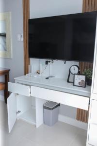 Kuchyň nebo kuchyňský kout v ubytování Condo18k Beside Mactan Newtown