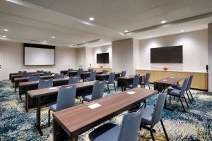 a conference room with tables and chairs and a screen at TownePlace Suites Salt Lake City Murray in Murray +24 photos
