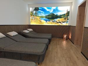 Część wypoczynkowa w obiekcie Wellness- und Familienhotel Dachsteinresort