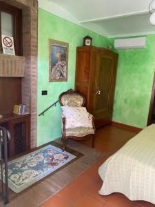 La Cassina Room tesisinde bir odada yatak veya yataklar +2 fotoğraf