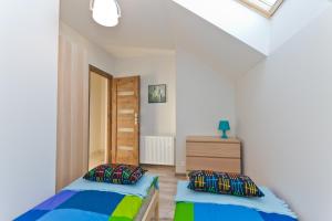 Postel nebo postele na pokoji v ubytování RESORT Riva & Avir