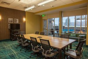 a conference room with a table and chairs at SpringHill Suites by Marriott Canton in North Canton +28 photos