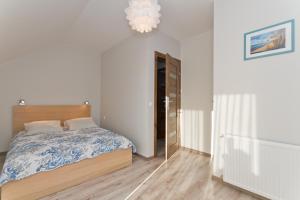 Postel nebo postele na pokoji v ubytování RESORT Riva & Avir
