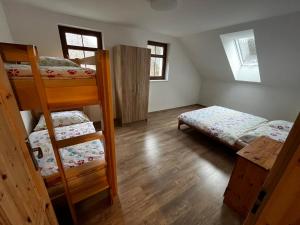 Postel nebo postele na pokoji v ubytování Chalupa Netopýr + 9 fotografií