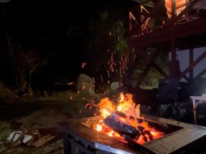 甲州Prime勝沼 森の中のプライベートログハウス 緑に包まれてBBQを楽しむ癒しの空間的相册照片