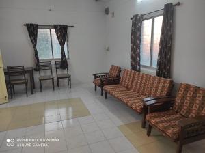 Istumisnurk majutusasutuses Swanand Home Stay