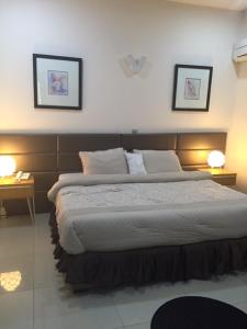 Katil atau katil-katil dalam bilik di Greens Manor VI