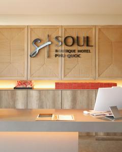 a store front with a sign on the wall at Soul Boutique Hotel Phu Quoc in Phu Quoc