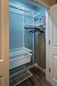 a closet with empty shelves in a room at TownePlace Suites by Marriott Nashville Goodlettsville in Goodlettsville